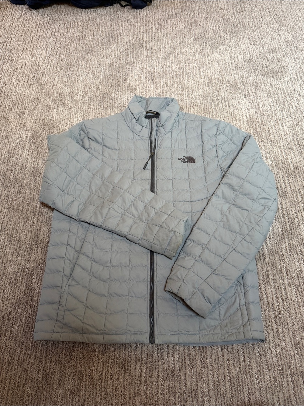 The North Face Men’s Light Gray Quilted Puffer Jacket
